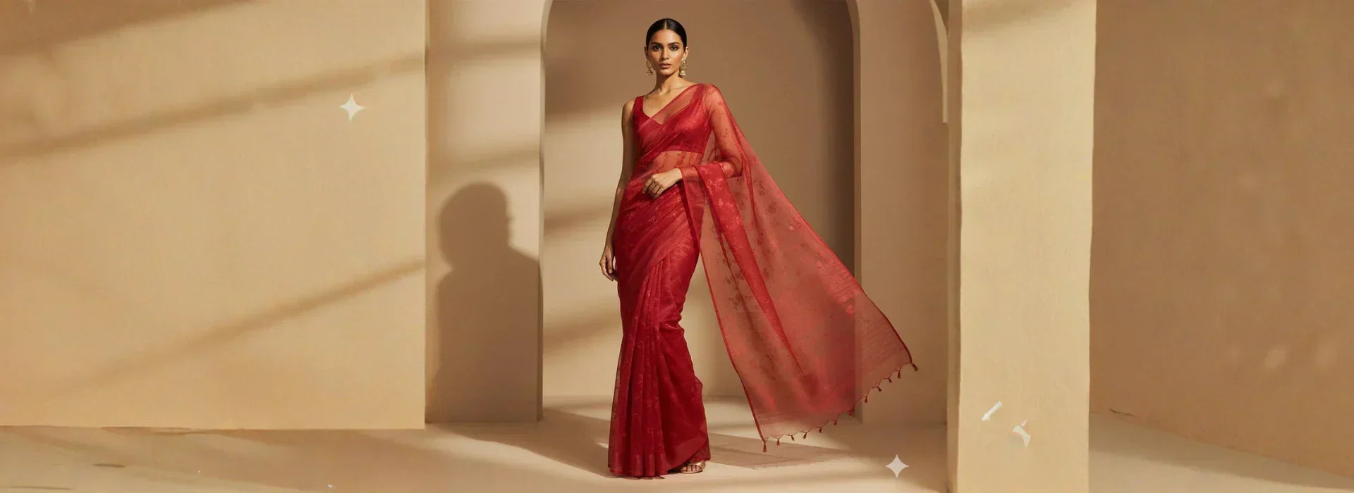 Timeless Allure of the Red Tissue Saree: A Shimmering Festive Favorite