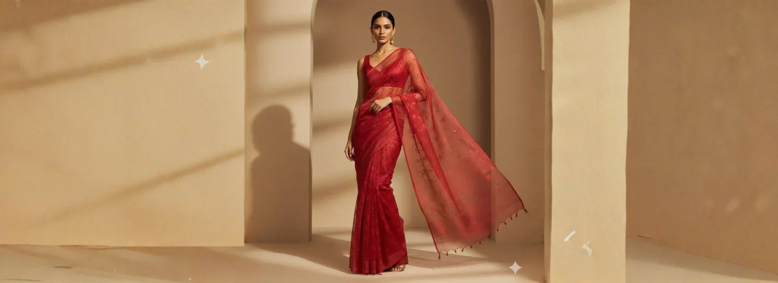 Timeless Allure of the Red Tissue Saree: A Shimmering Festive Favorite