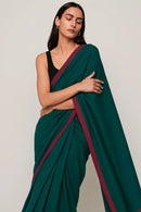 AHILYA | Mul Cotton | Indidha Saree -  Ahilya – Handloom Mul Cotton Saree in Emerald Green | Lightweight & Elegant  Experience the soft elegance of Ahilya – a handloom mul cotton saree in emerald green. Lightweight, breathable, and beautifully minimalist. Perfect for everyday wear.