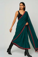 AHILYA | Mul Cotton | Indidha Saree -  Ahilya – Handloom Mul Cotton Saree in Emerald Green | Lightweight & Elegant  Experience the soft elegance of Ahilya – a handloom mul cotton saree in emerald green. Lightweight, breathable, and beautifully minimalist. Perfect for everyday wear.