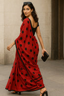 MASHUQA | Mul Cotton | Indidha Saree -  Buy Red Handloom Mul Cotton Saree with Black Polka Dots | Lightweight & Bold  Shop this stunning red mul cotton saree with black polka dots. Handloom made, ultra-soft, and perfect for summer. Add a bold twist to your ethnic wardrobe!
