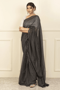 PRISHA | Mul Cotton | Indidha Saree -  Prisha: Pure Mul Cotton Handloom Saree | Indidha  Shop 'Prisha' – a breathable pure mul cotton saree in elegant black & white stripes. Lightweight, handloom-woven & perfect for all-day wear.