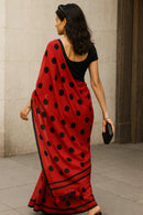 MASHUQA | Mul Cotton | Indidha Saree -  Buy Red Handloom Mul Cotton Saree with Black Polka Dots | Lightweight & Bold  Shop this stunning red mul cotton saree with black polka dots. Handloom made, ultra-soft, and perfect for summer. Add a bold twist to your ethnic wardrobe!
