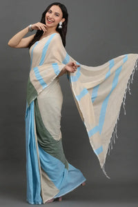 SERENE SKY | Cotton | Indidha Saree -  Elegant Pastel Handloom Cotton Saree for Summer  Drift into serenity with the Serene Sky khadi cotton saree, a soft, airy drape perfect for all-day elegance.