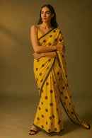 EBONY SUNSHINE | Mul Cotton | Indidha Saree -  Buy Ebony Sunshine Mul Cotton Saree at Indidha.com - Bold & Stylish  Shop the Ebony Sunshine Mul Cotton Saree at Indidha. With bold hues and soft texture, this saree is perfect for blending style with comfort.