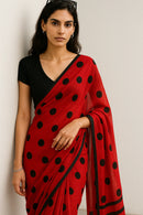 MASHUQA | Mul Cotton | Indidha Saree -  Buy Red Handloom Mul Cotton Saree with Black Polka Dots | Lightweight & Bold  Shop this stunning red mul cotton saree with black polka dots. Handloom made, ultra-soft, and perfect for summer. Add a bold twist to your ethnic wardrobe!
