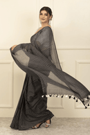 PRISHA | Mul Cotton | Indidha Saree -  Prisha: Pure Mul Cotton Handloom Saree | Indidha  Shop 'Prisha' – a breathable pure mul cotton saree in elegant black & white stripes. Lightweight, handloom-woven & perfect for all-day wear.