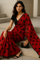 MASHUQA | Mul Cotton | Indidha Saree -  Buy Red Handloom Mul Cotton Saree with Black Polka Dots | Lightweight & Bold  Shop this stunning red mul cotton saree with black polka dots. Handloom made, ultra-soft, and perfect for summer. Add a bold twist to your ethnic wardrobe!
