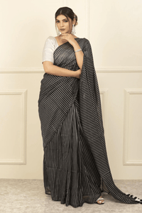 PRISHA | Mul Cotton | Indidha Saree -  Prisha: Pure Mul Cotton Handloom Saree | Indidha  Shop 'Prisha' – a breathable pure mul cotton saree in elegant black & white stripes. Lightweight, handloom-woven & perfect for all-day wear.