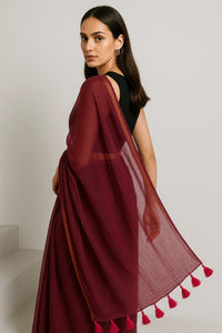 JIYA | Mul Cotton | Indidha Saree -  Shop Jiya Mul Cotton Saree – Light & Breezy Wear  Pure mul cotton saree with an elegant copper border and matching tassels. Perfect for any occasion to showcase timeless beauty and sophistication. Shop now!