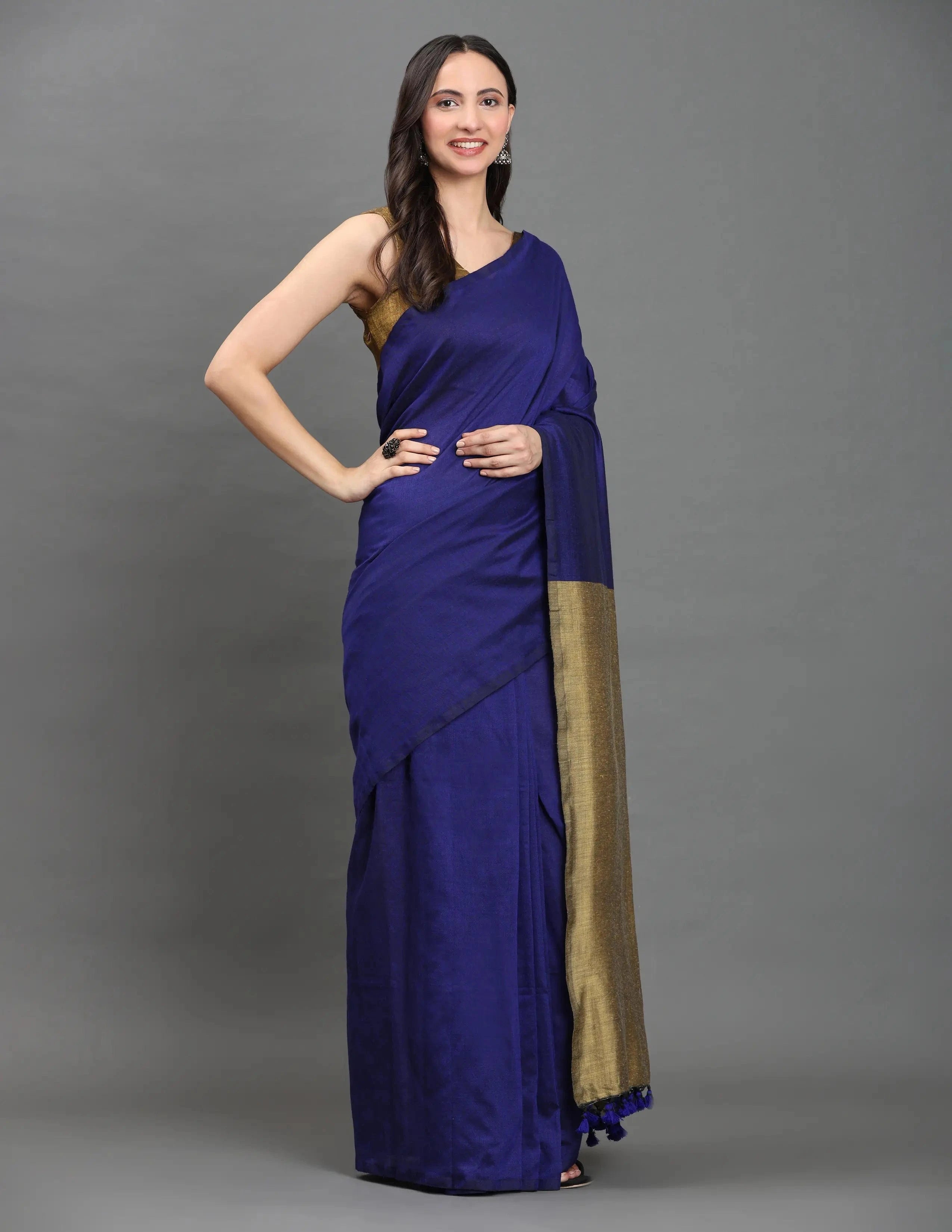 MIDNIGHT SONATA | Cotton | Indidha Saree -  Royal Blue & Gold Handloom Cotton Saree | Elegant Tassel Saree for Festive Wear  Shop our handcrafted royal blue and gold handloom cotton saree featuring a golden pallu and tassel details. Perfect for festive elegance or all-day comfort wear.