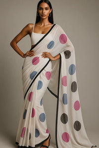 BREEZY DOTS | Mul Cotton | Indidha Saree -  Lightweight Mul Cotton Saree with Polka Dots – Shop Now!  Looking for an easy-to-drape saree? This breathable mul cotton saree with vibrant polka dots and a timeless black border is just what you need!