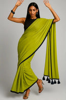 Chartreuse Charm | Mul Cotton | Indidha Saree -  Chartreuse Charm - Handloom Mul Cotton Saree | Indidha  Shop Chartreuse Charm – a vibrant handloom mul cotton saree in chartreuse green with black tassels. Breezy, minimal, and perfect for summer. Only at Indidha.

