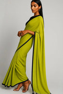 Chartreuse Charm | Mul Cotton | Indidha Saree -  Chartreuse Charm - Handloom Mul Cotton Saree | Indidha  Shop Chartreuse Charm – a vibrant handloom mul cotton saree in chartreuse green with black tassels. Breezy, minimal, and perfect for summer. Only at Indidha.

