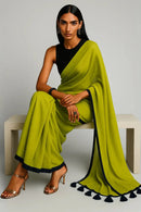 Chartreuse Charm | Mul Cotton | Indidha Saree -  Chartreuse Charm - Handloom Mul Cotton Saree | Indidha  Shop Chartreuse Charm – a vibrant handloom mul cotton saree in chartreuse green with black tassels. Breezy, minimal, and perfect for summer. Only at Indidha.

