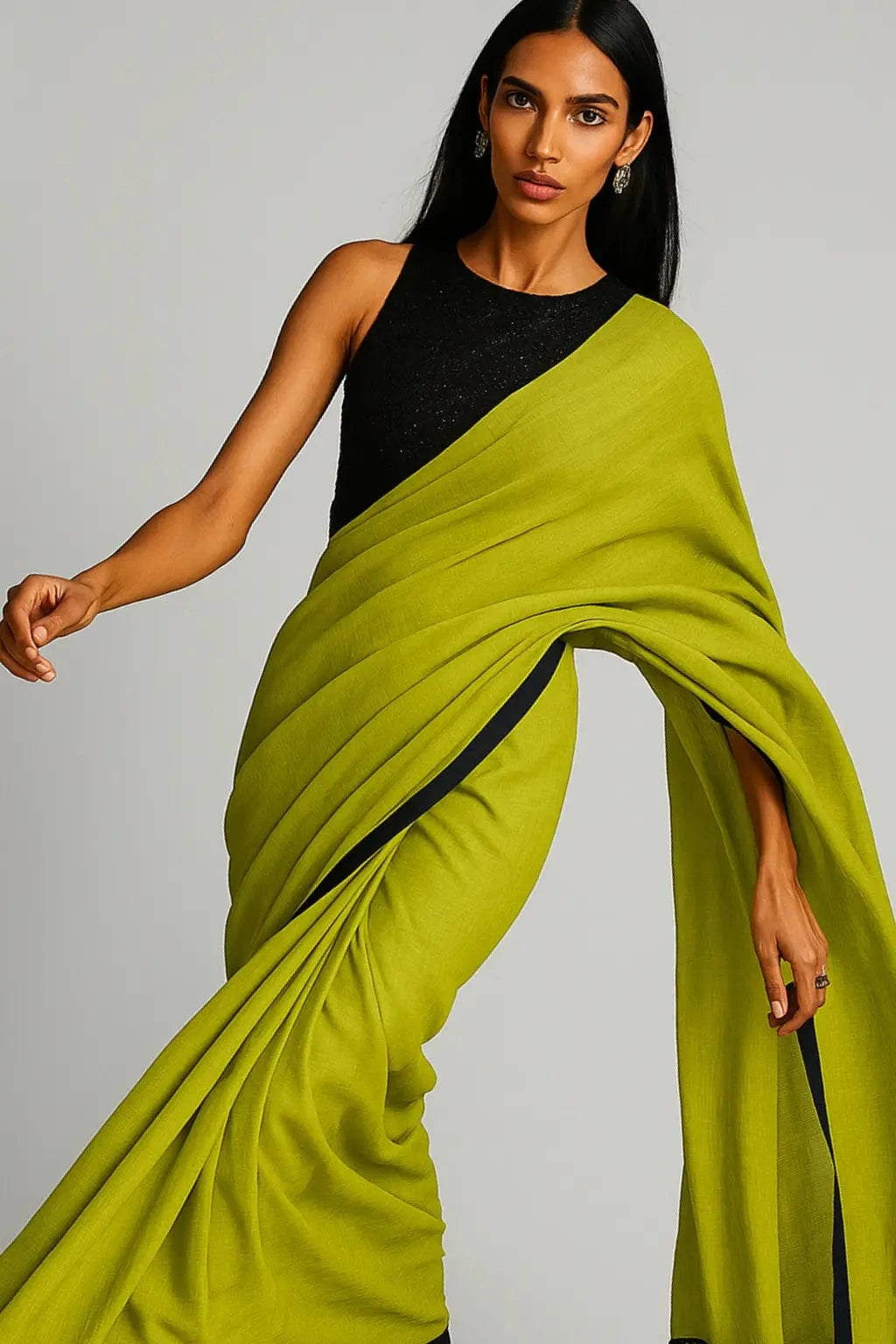 Chartreuse Charm | Mul Cotton | Indidha Saree -  Chartreuse Charm - Handloom Mul Cotton Saree | Indidha  Shop Chartreuse Charm – a vibrant handloom mul cotton saree in chartreuse green with black tassels. Breezy, minimal, and perfect for summer. Only at Indidha.

