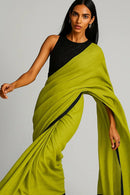 Chartreuse Charm | Mul Cotton | Indidha Saree -  Chartreuse Charm - Handloom Mul Cotton Saree | Indidha  Shop Chartreuse Charm – a vibrant handloom mul cotton saree in chartreuse green with black tassels. Breezy, minimal, and perfect for summer. Only at Indidha.

