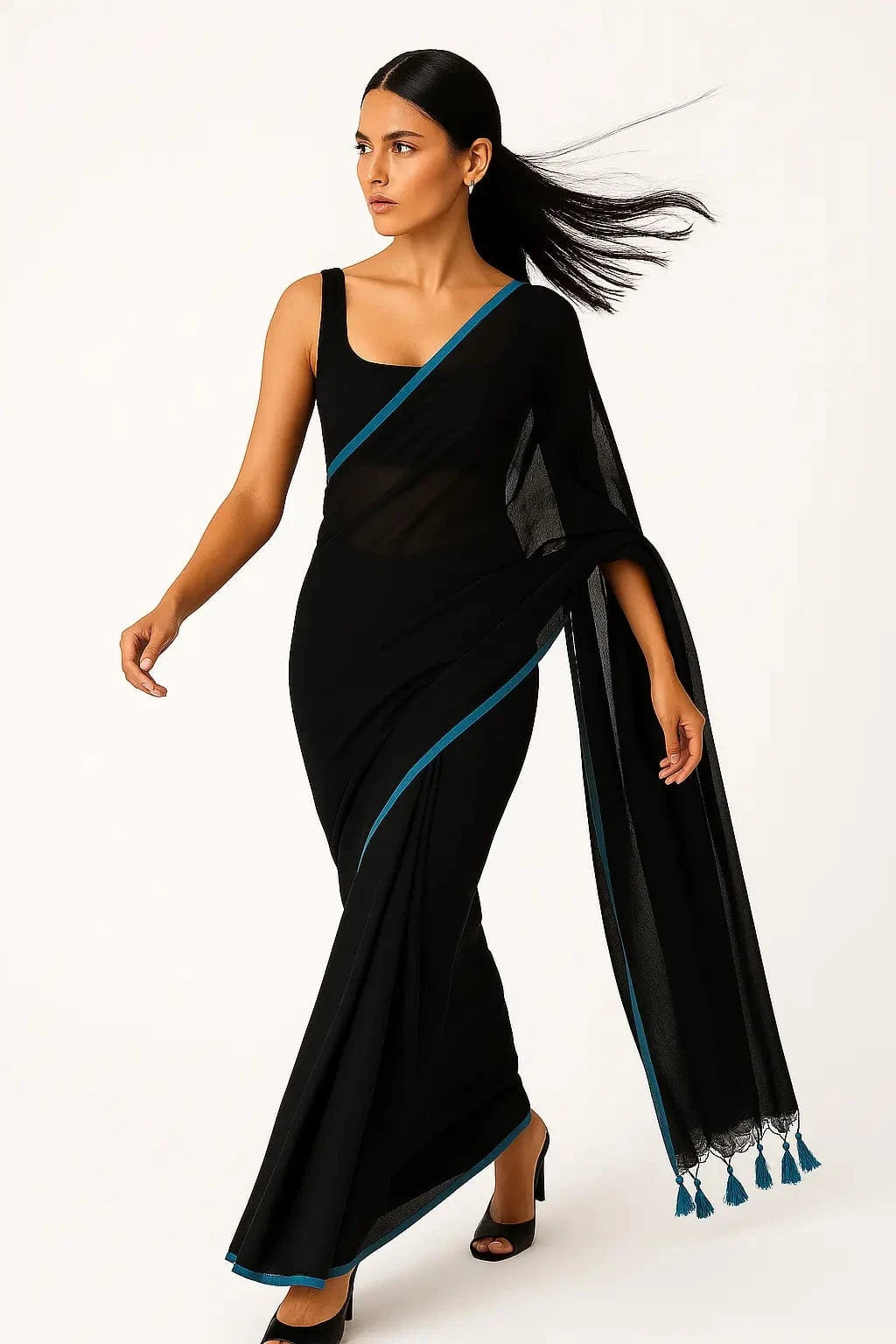 SERENITY BREEZE | Mul Cotton | Indidha Saree -  Serenity Breeze – Black Mul Cotton Saree | Indidha  Shop Serenity Breeze, a handcrafted black mul cotton saree with blue edging & tassels. Lightweight, breathable, and effortlessly elegant. Only at Indidha.