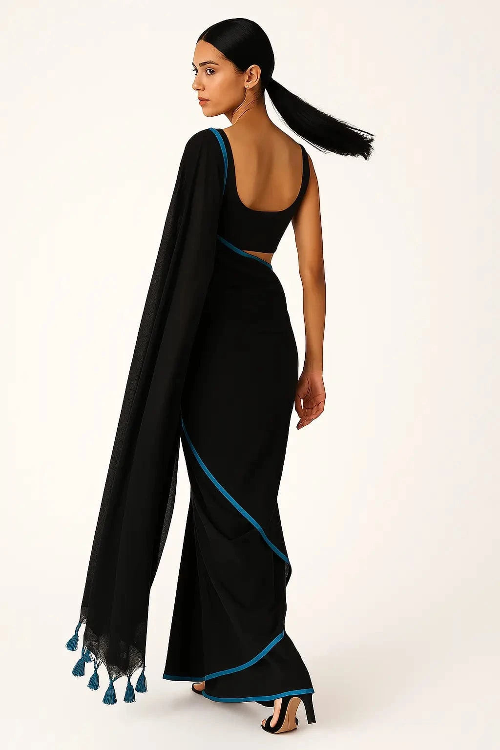 SERENITY BREEZE | Mul Cotton | Indidha Saree -  Serenity Breeze – Black Mul Cotton Saree | Indidha  Shop Serenity Breeze, a handcrafted black mul cotton saree with blue edging & tassels. Lightweight, breathable, and effortlessly elegant. Only at Indidha.
