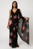 GULABO | Organza | Indidha Saree -  Buy Organza Saree | Incredibly Authentic Insanely Affordable  This stunning Organza saree is a sight to behold. The lightweight fabric of the saree is perfect for those who want to move around freely and comfortably without sacrificing style. The gorgeous shades are blended seamlessly throughout the saree, creating a mesmerizing visual effect. The saree's lightness adds to its overall elegance and grace, making it a perfect choice for special occasions or daily wear. 