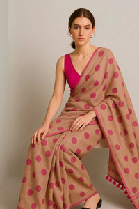KOMAL TARA | Mul Cotton | Indidha Saree -  Komal Tara – Handloom Mul Cotton Saree in Soft Beige with Soft Pink  Polka Dots & Tassels  Shop Komal Tara – a soft handloom mul cotton saree in beige with pink polka dots, tassels, and timeless charm. Light, breathable & perfect for casual elegance.