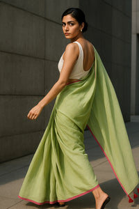 Lime Whisper | Handloom Mul Cotton | Indidha Saree -  Lime Green Handloom Mul Cotton Saree with Pink Border – Lightweight Summer Saree  Shop the Lime Whisper saree, a handcrafted handloom mul cotton saree in lime green with a rose-pink border and tassels. It is ultra-light, breathable, and the blouse is not included.