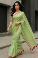 Lime Whisper | Handloom Mul Cotton | Indidha Saree -  Lime Green Handloom Mul Cotton Saree with Pink Border – Lightweight Summer Saree  Shop the Lime Whisper saree, a handcrafted handloom mul cotton saree in lime green with a rose-pink border and tassels. It is ultra-light, breathable, and the blouse is not included.