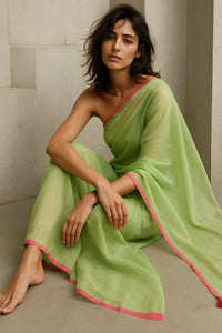 Lime Whisper | Handloom Mul Cotton | Indidha Saree -  Lime Green Handloom Mul Cotton Saree with Pink Border – Lightweight Summer Saree  Shop the Lime Whisper saree, a handcrafted handloom mul cotton saree in lime green with a rose-pink border and tassels. It is ultra-light, breathable, and the blouse is not included.
