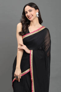 MIDNIGHT GULABO | Mul cotton | Indidha Saree -  Black Handloom Mul Cotton Saree with Pink Border – Lightweight & Elegant | Indidha  Shop the stunning black handloom mul cotton saree with pink scallop border and golden zari. Lightweight, breathable, and perfect for effortless festive styling.