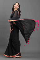 MIDNIGHT GULABO | Mul cotton | Indidha Saree -  Black Handloom Mul Cotton Saree with Pink Border – Lightweight & Elegant | Indidha  Shop the stunning black handloom mul cotton saree with pink scallop border and golden zari. Lightweight, breathable, and perfect for effortless festive styling.