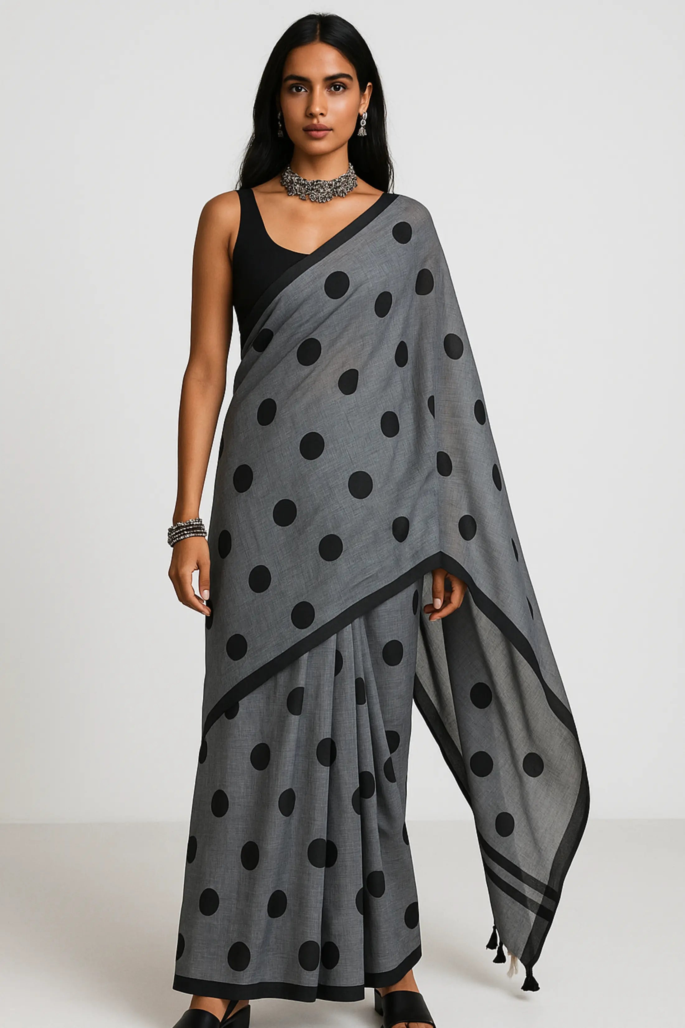 MONOCHROME MAGIC | Mul Cotton | Indidha Saree -  Minimalist Grey Saree with Black Polka Dots  This mul cotton saree in soft grey with playful black polka dots combines comfort with timeless style. It is perfect for effortless everyday wear.