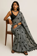 MONOCHROME MAGIC | Mul Cotton | Indidha Saree -  Minimalist Grey Saree with Black Polka Dots  This mul cotton saree in soft grey with playful black polka dots combines comfort with timeless style. It is perfect for effortless everyday wear.