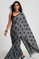 MONOCHROME MAGIC | Mul Cotton | Indidha Saree -  Minimalist Grey Saree with Black Polka Dots  This mul cotton saree in soft grey with playful black polka dots combines comfort with timeless style. It is perfect for effortless everyday wear.