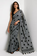 MONOCHROME MAGIC | Mul Cotton | Indidha Saree -  Minimalist Grey Saree with Black Polka Dots  This mul cotton saree in soft grey with playful black polka dots combines comfort with timeless style. It is perfect for effortless everyday wear.