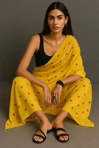 Sunshine Dil Se | Mul Cotton | Indidha Saree -  Yellow Mul Cotton Saree with Red Hearts | Handloom Love | Indidha  Shop a sunshine yellow handloom mul cotton saree adorned with red hearts. Lightweight, breathable & bold—perfect for women who wear their hearts out loud.
