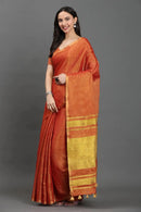TANGERINE ZARI | Linen Tissue | Indidha Saree -  Handloom Linen Tissue Saree in Rust Gold | Indidha Saree  Drape yourself in a handloom linen tissue saree in copper-rust with golden zari. Lightweight, elegant & woven for timeless festive grace.