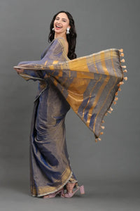 Twilight Glimmer | Linen Tissue | Indidha Saree -  Twilight Glimmer - Handloom Linen Tissue Saree Online  Shop Twilight Glimmer, a dusky handloom linen tissue saree with golden zari shine. Lightweight, festive-ready, and weaver-crafted for timeless elegance.