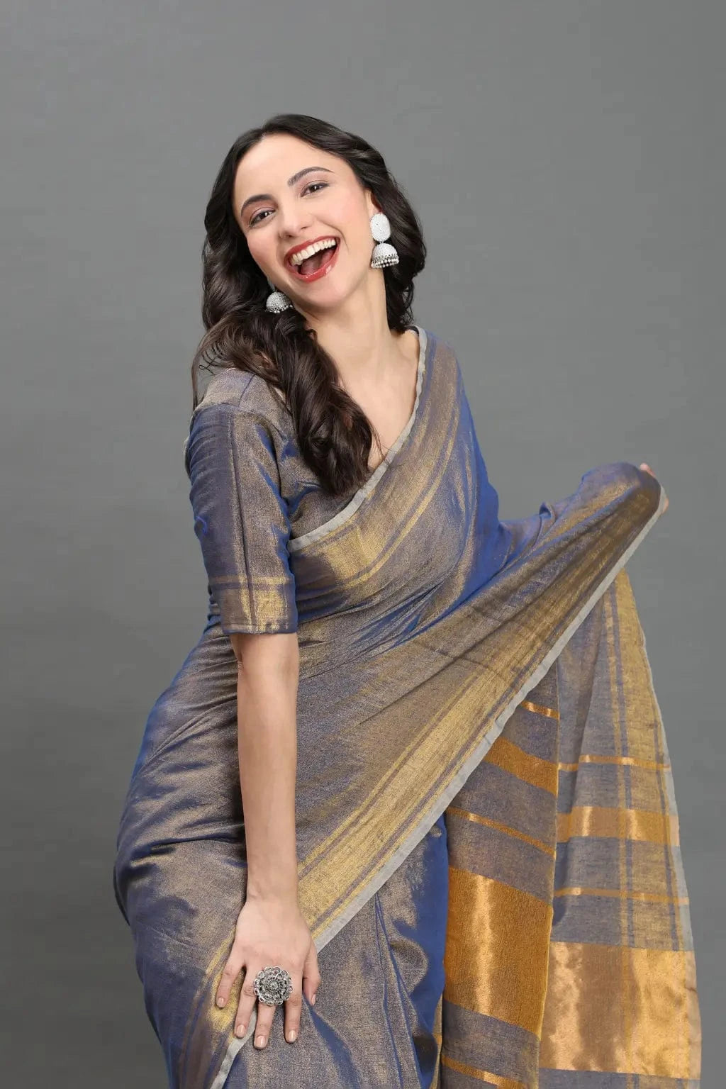 Twilight Glimmer | Linen Tissue | Indidha Saree -  Twilight Glimmer - Handloom Linen Tissue Saree Online  Shop Twilight Glimmer, a dusky handloom linen tissue saree with golden zari shine. Lightweight, festive-ready, and weaver-crafted for timeless elegance.