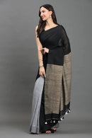 WOVEN TIDES | Pure Cotton | Indidha Saree -  Feel the Soft Pure Cotton Saree | Indidha   Shop our elegant pure cotton saree in black & grey. Feel the soft, breathable fabric with tassel details. Style your modern ethnic look now!