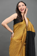 Zafran Noir | Cotton | Indidha Saree -  Mustard Handloom Cotton Saree with Black Pallu | Indidha  Elevate your everyday style with this mustard handloom cotton saree. Bold black pallu, featherlight feel—perfect for work and beyond. Shop now at Indidha!