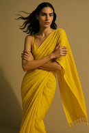 Zard Zehra | Mulmul Cotton | Indidha Saree -  Zard Zehra – Yellow Handloom Mul Cotton Saree | Indidha  Zard Zehra is a turmeric-yellow mul cotton saree—light, breathable, and radiant. Shop this handcrafted beauty at Indidha.