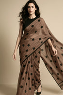 GYANADA | Mul Cotton | Indidha Saree -  Buy Gyanada Mul Cotton Saree Online — Graceful Wear  Shop Gyanada – a handloom mul cotton saree in earthy brown with bold black polka dots. Lightweight, breathable & elegant. Perfect for effortless summer styling.