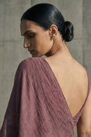 Soft mauve slub cotton saree with refined drape and subtle texture