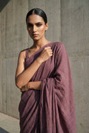 Elegant dusty mauve cotton saree styled for modern festive and casual wear