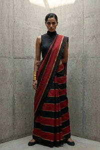 Graphic red and black striped mul cotton saree with micro-gold zari detailing